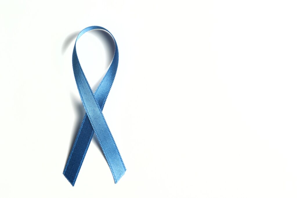 blue ribbon on a white background against child abuse, and symbol in defense of education
